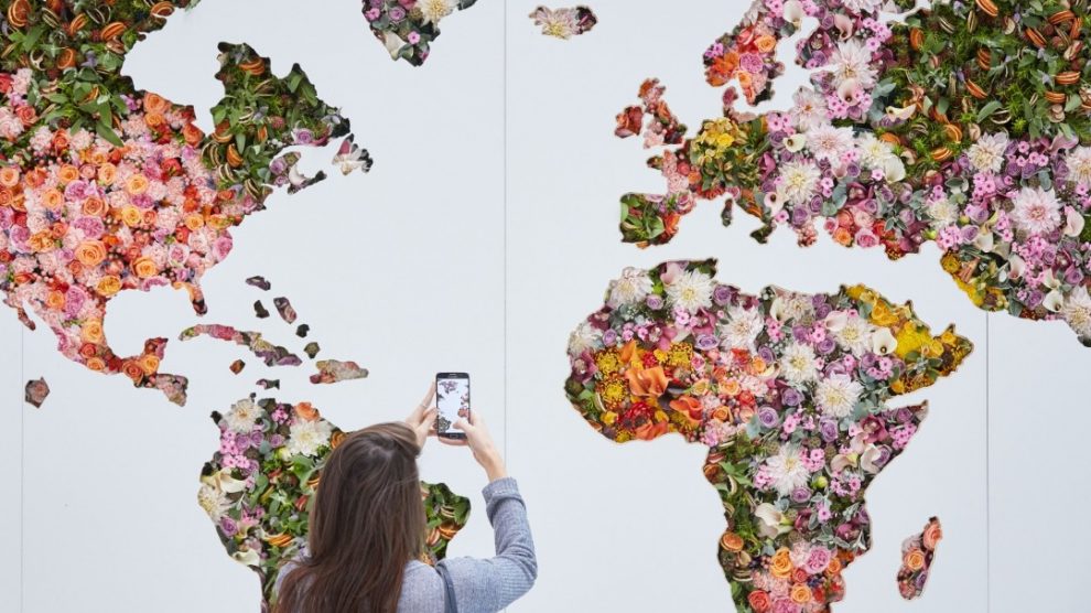 A giant floral map of the world is unveiled at London Heathrow Airport..