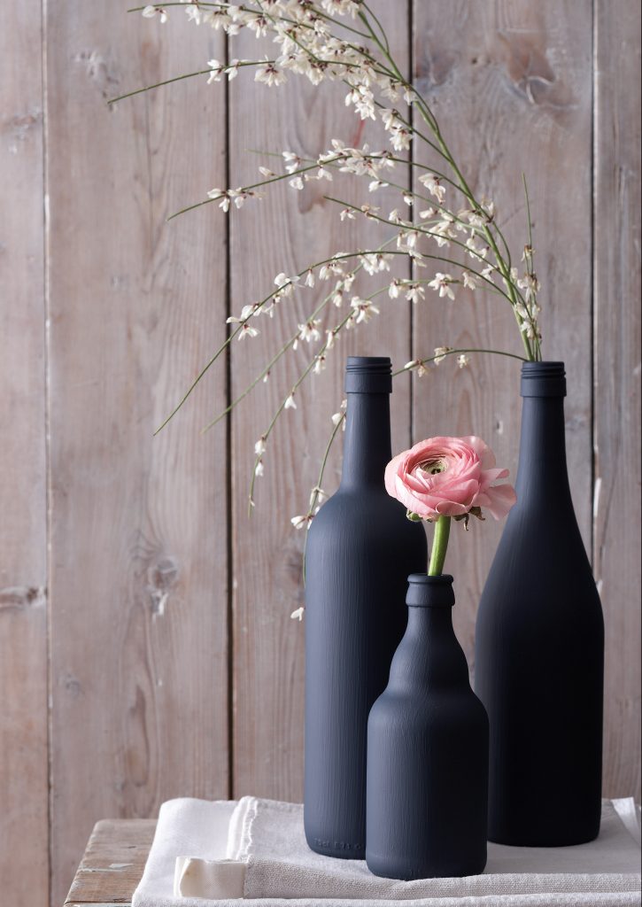 pianted bottles as vases